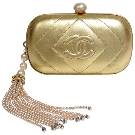 chanel quilted satin gold clutch flower|Chanel clutch purse.